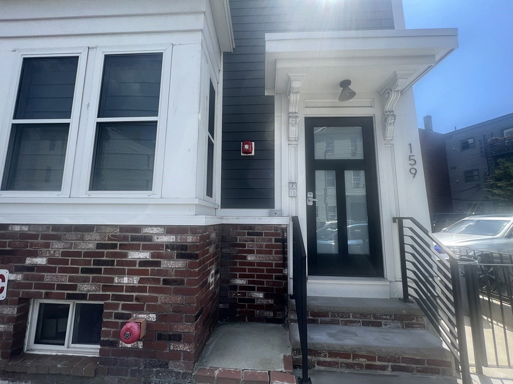 159 Bennington Street, Unit 2 Boston, MA 02128 - Photo 15 of 20 a bathroom with a sink and a mirror