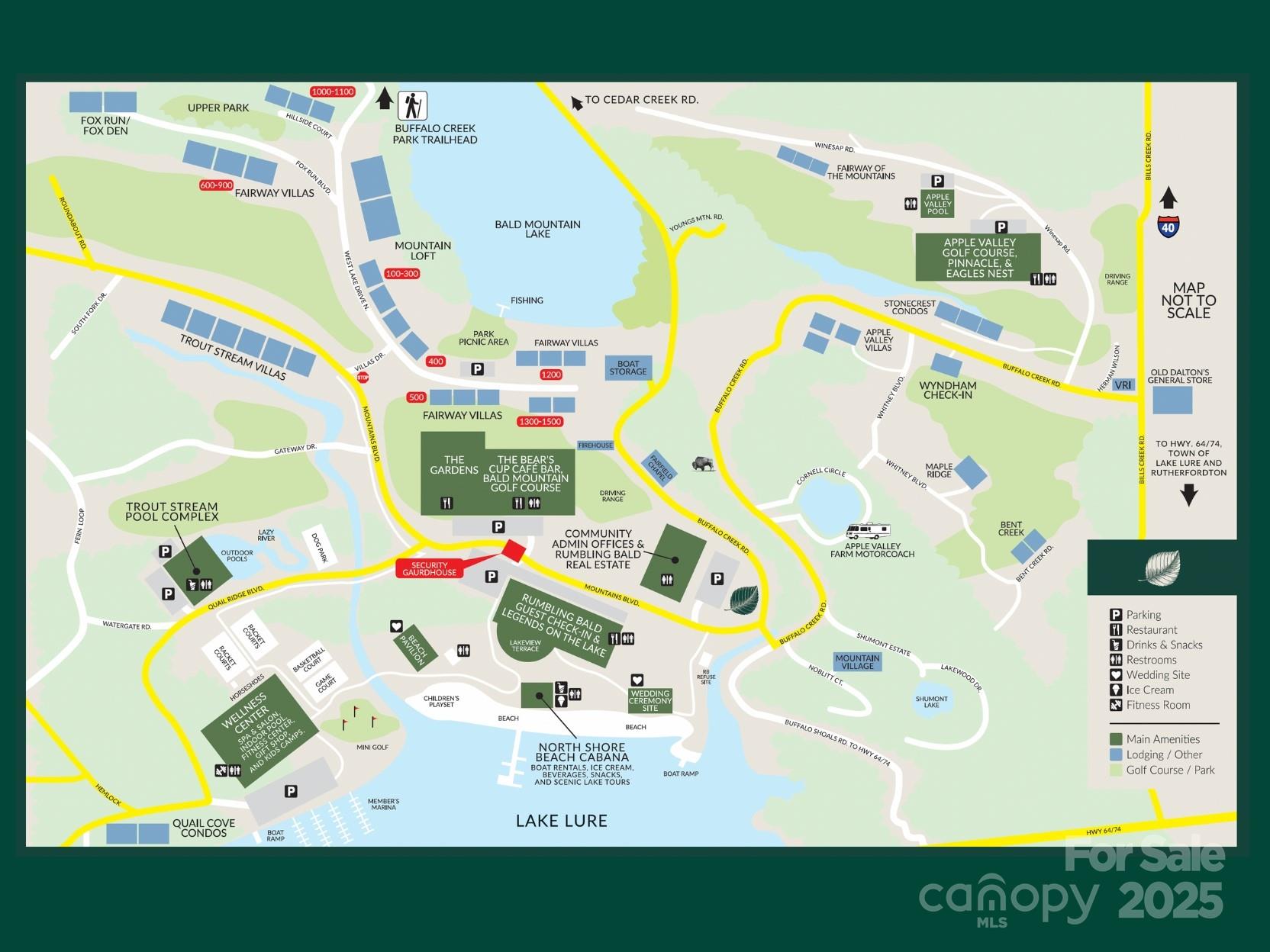 Lot 96 Chalet Rd Lake Lake Lure, NC 28746 - Photo 14 of 14 a utility room with a bed and a table