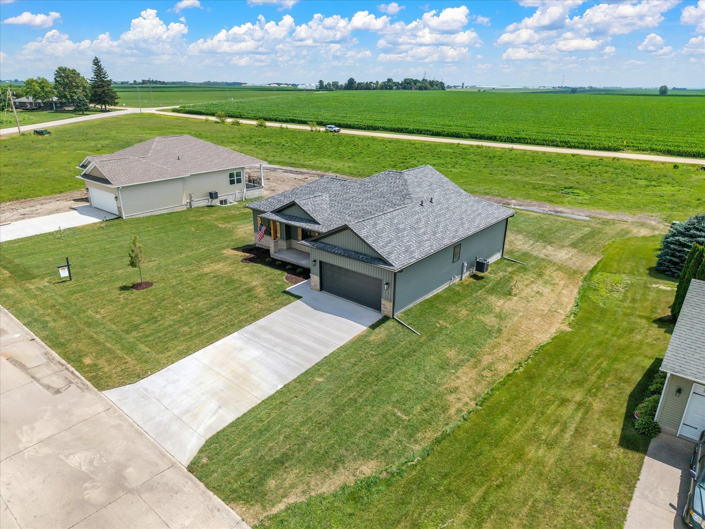 455 Rhonda Road New Liberty, IA 52765 - Photo 6 of 54 an aerial view of a house with a big yard