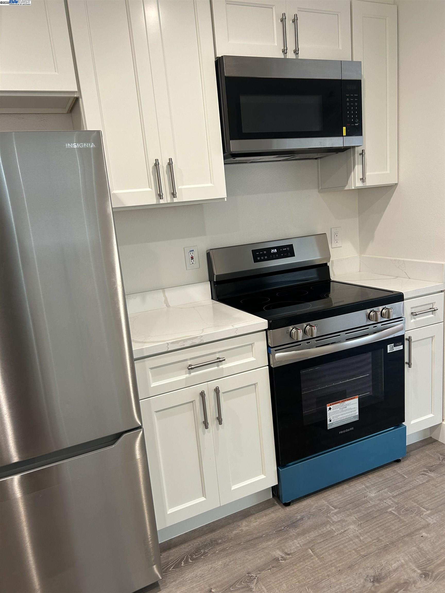 7808 Weld Street Oakland, CA 94621 - Photo 3 of 8 a stove top oven sitting inside of a kitchen