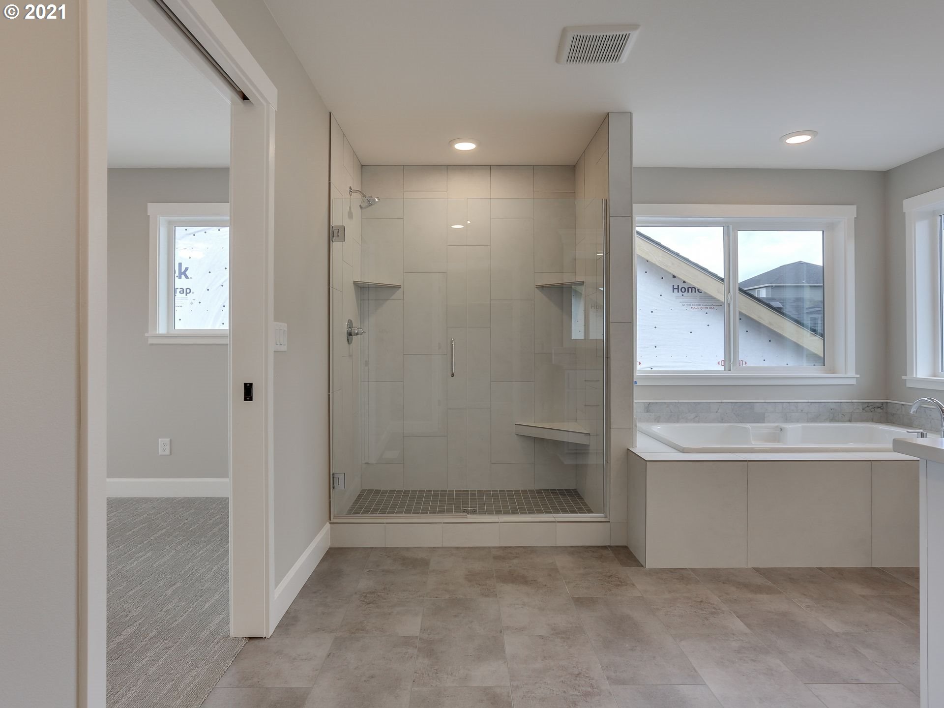 4128 South 17th Way Ridgefield, WA 98642 - Photo 15 of 21 a bathroom with a bathtub and shower