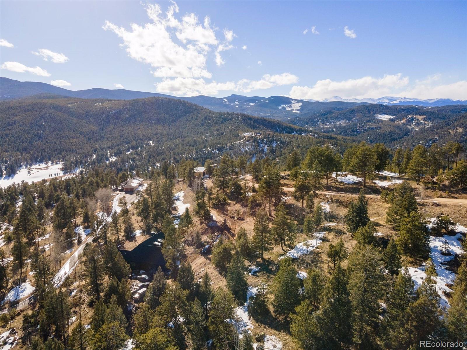 7142 Lynx Lair Road Evergreen, CO 80439 - Photo 5 of 7 a view of a city