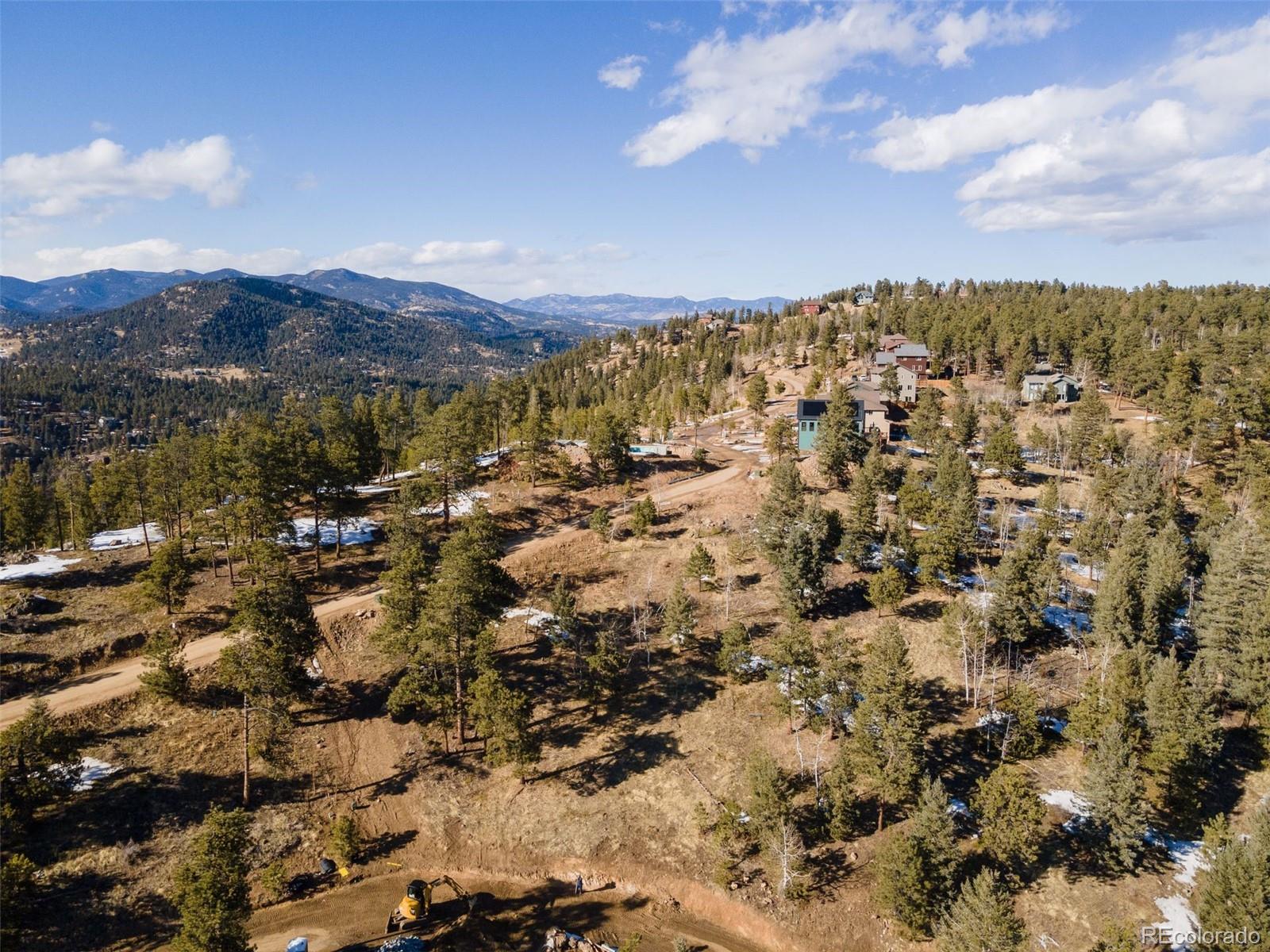 7142 Lynx Lair Road Evergreen, CO 80439 - Photo 6 of 7 an aerial view of residential house and green space