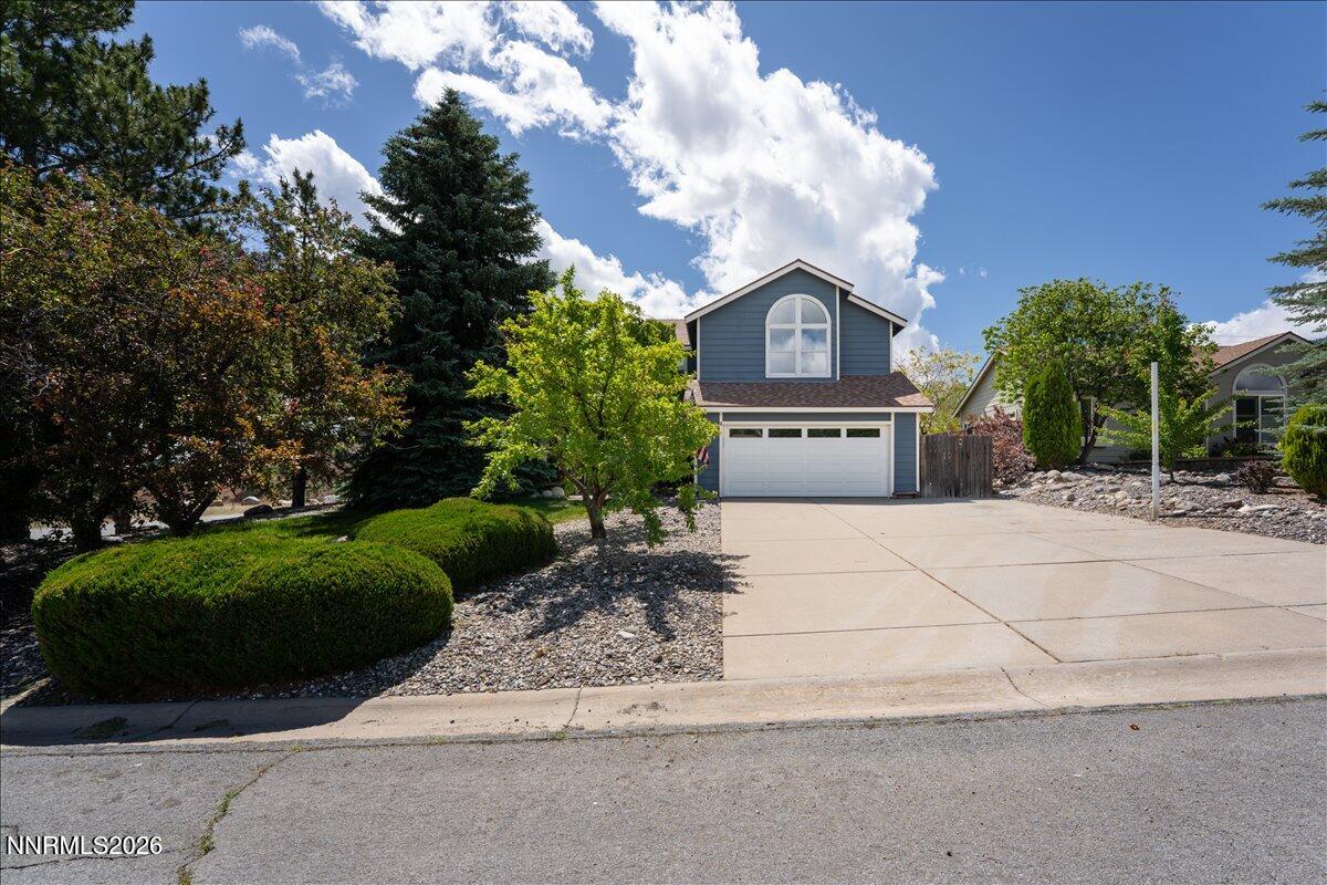 10 Eagle Claw Court Reno, NV 89523 - Photo 2 of 36 a front view of a house with a yard and garage