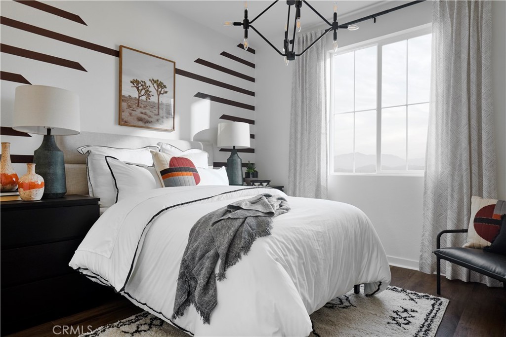 11531 Jack Street Beaumont, CA 92223 - Photo 15 of 16 a bedroom with bed and a window