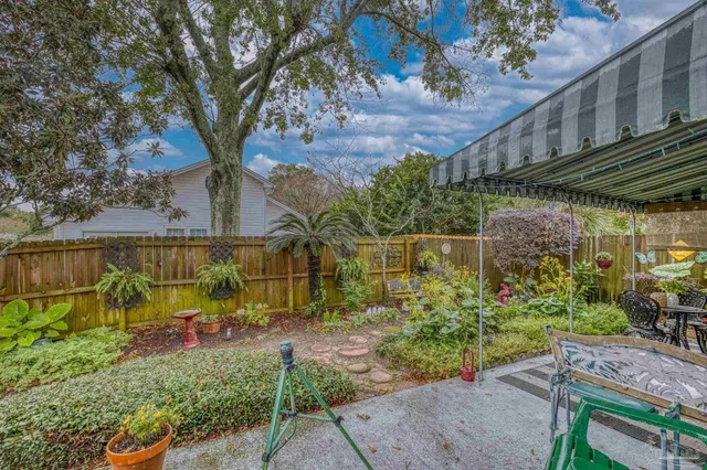 a house view with sitting space and garden space