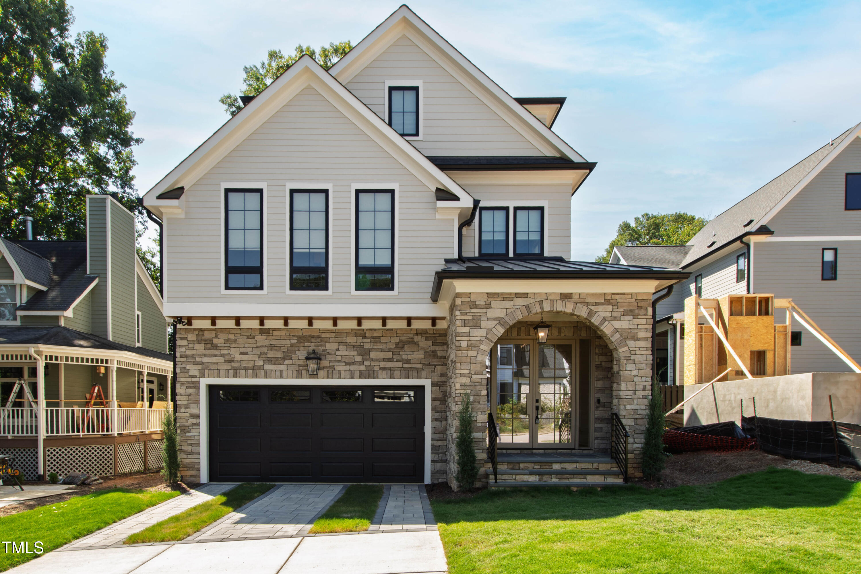 202 Georgetown Road Raleigh, NC 27608 - Photo 1 of 64 a front view of a house with garden