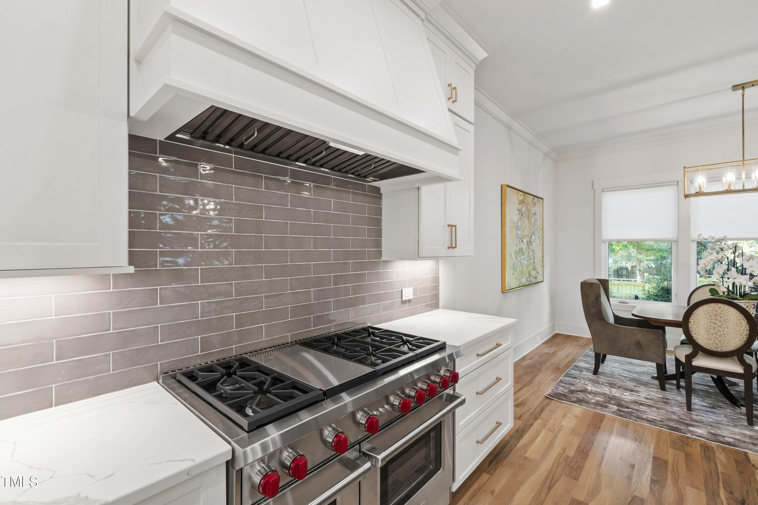202 Georgetown Road Raleigh, NC 27608 - Photo 20 of 64 a stove top oven sitting inside of a kitchen