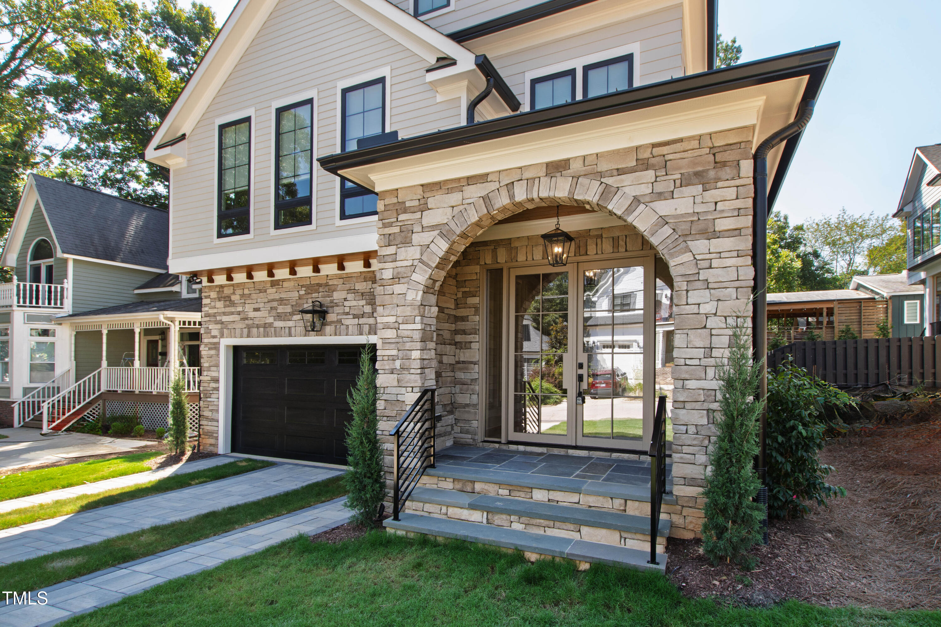 202 Georgetown Road Raleigh, NC 27608 - Photo 2 of 64 a front view of a house with garden