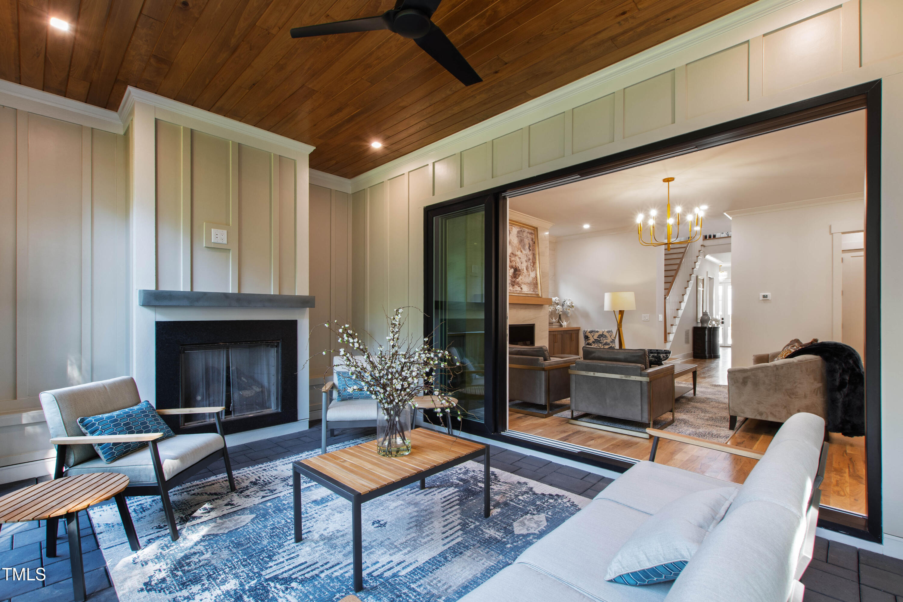202 Georgetown Road Raleigh, NC 27608 - Photo 29 of 64 a living room with furniture and a fireplace