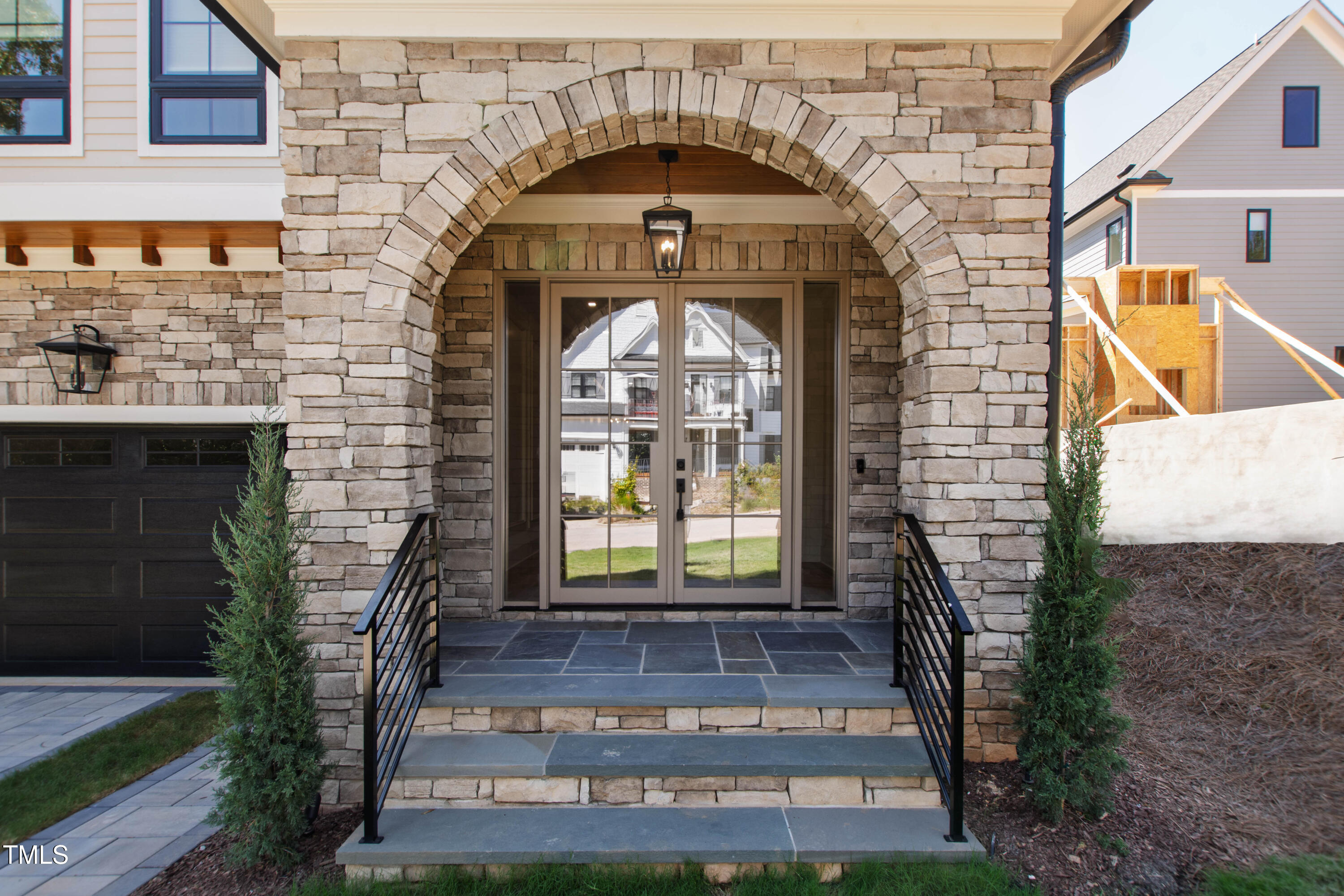 202 Georgetown Road Raleigh, NC 27608 - Photo 3 of 64 a front view of a house with garden
