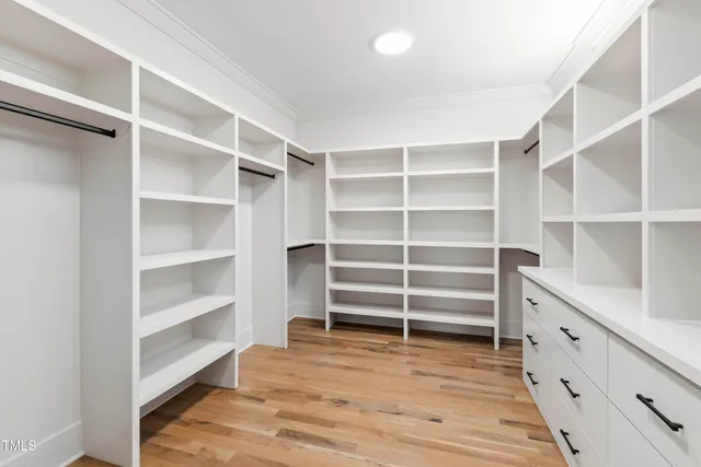 a view of an empty walk in closet