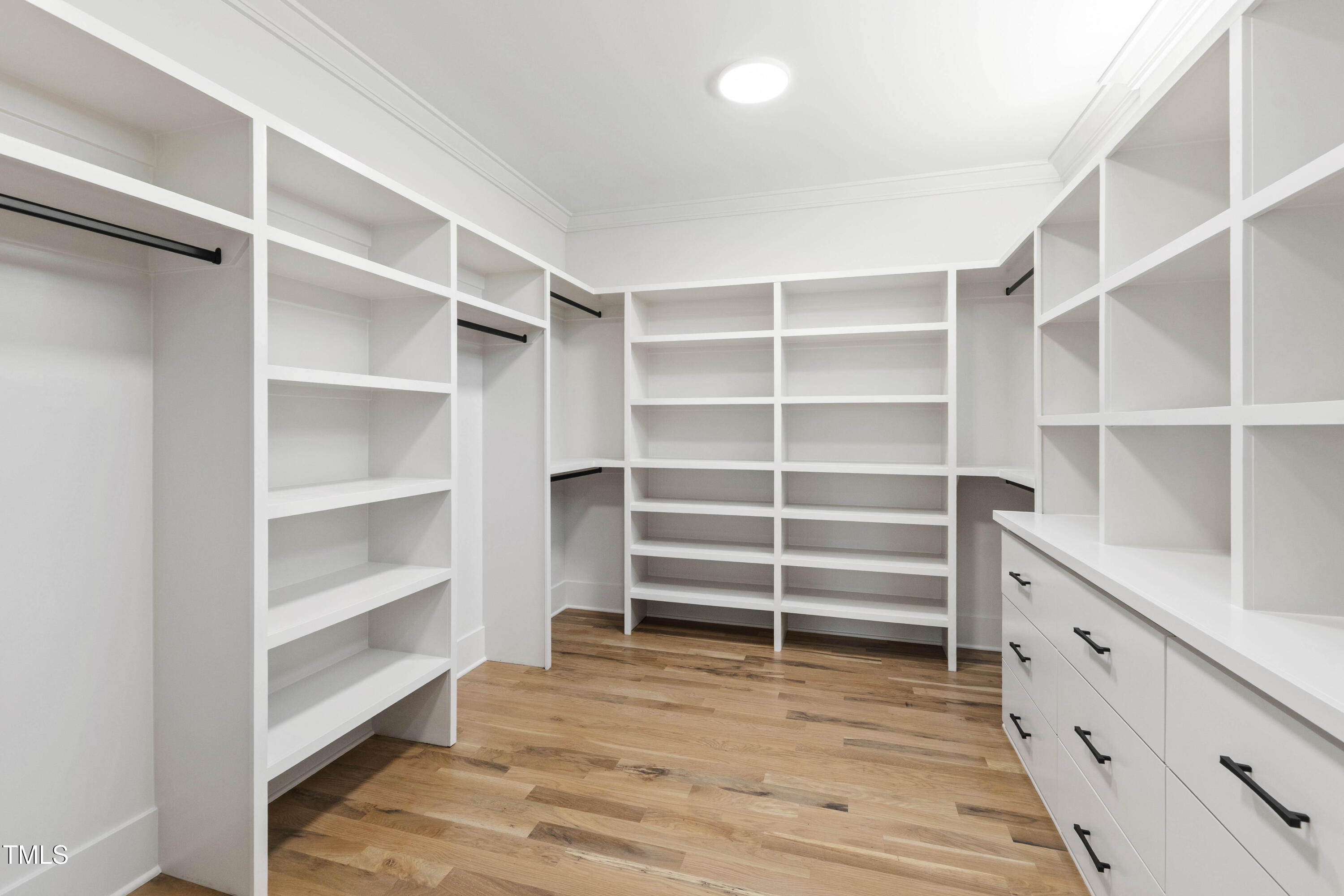 202 Georgetown Road Raleigh, NC 27608 - Photo 40 of 64 a room with walk in closet and a window