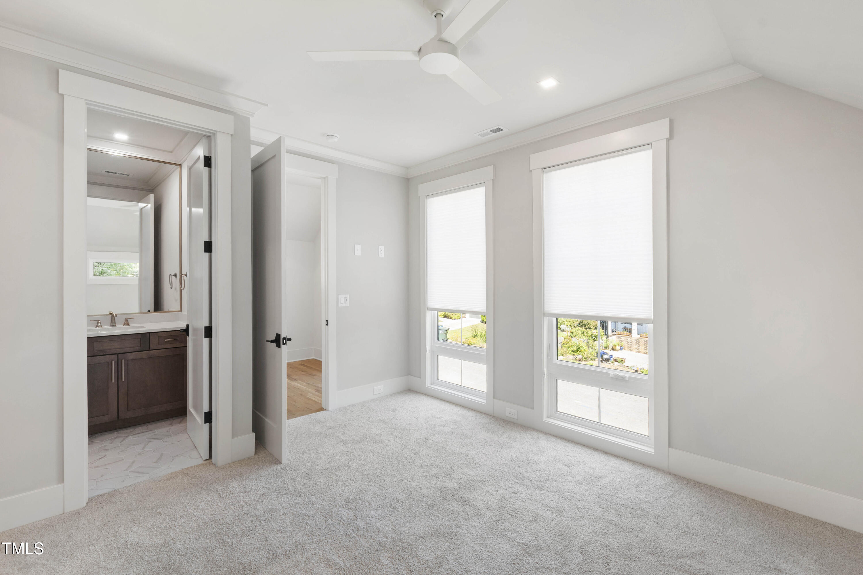 202 Georgetown Road Raleigh, NC 27608 - Photo 41 of 64 an empty room with windows and cabinet