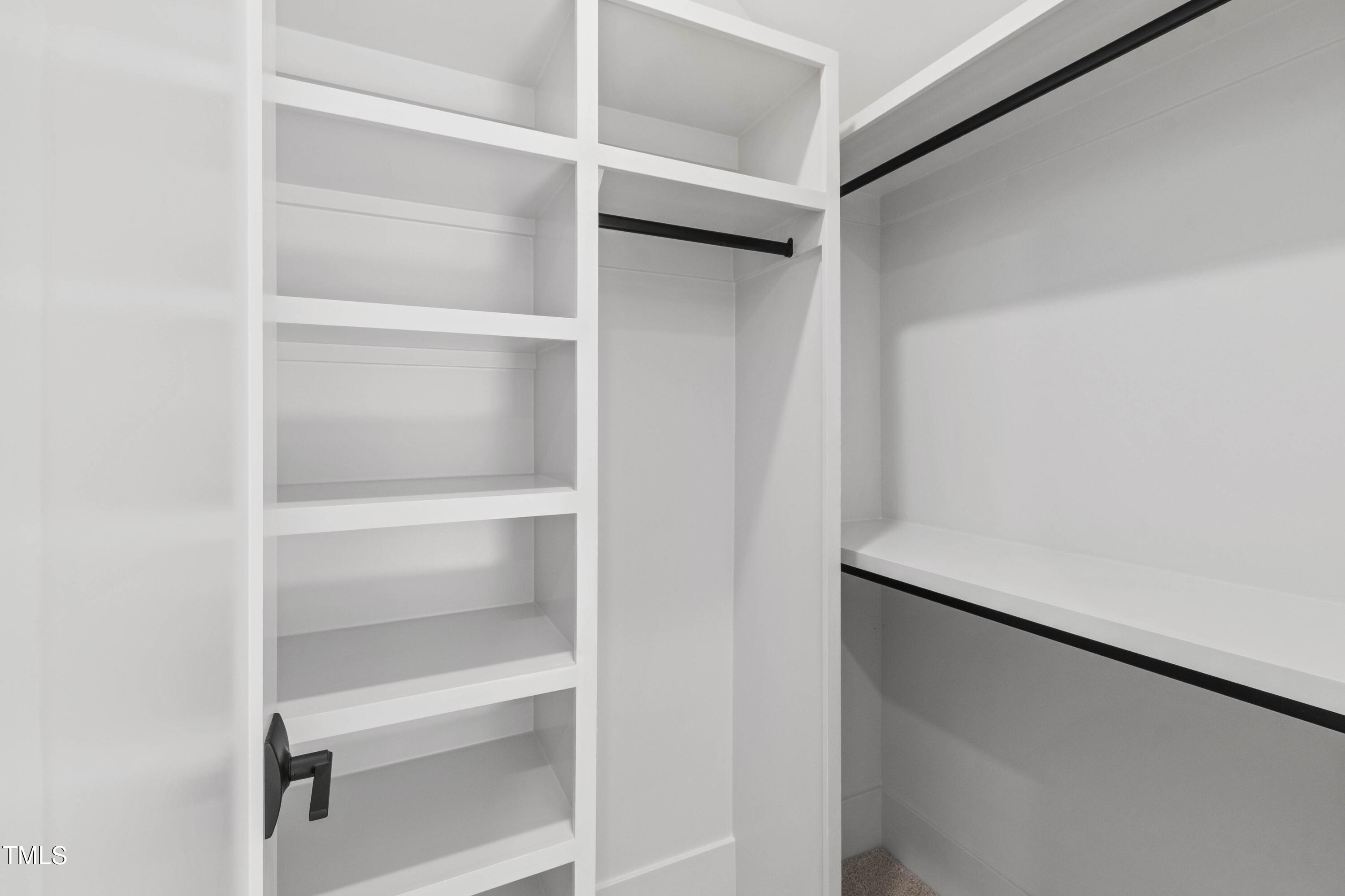 202 Georgetown Road Raleigh, NC 27608 - Photo 49 of 64 a view of an empty walk in closet