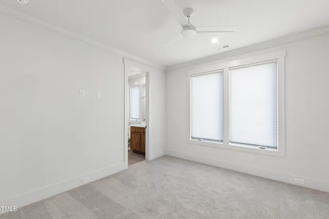 a front view of house with yard and garage