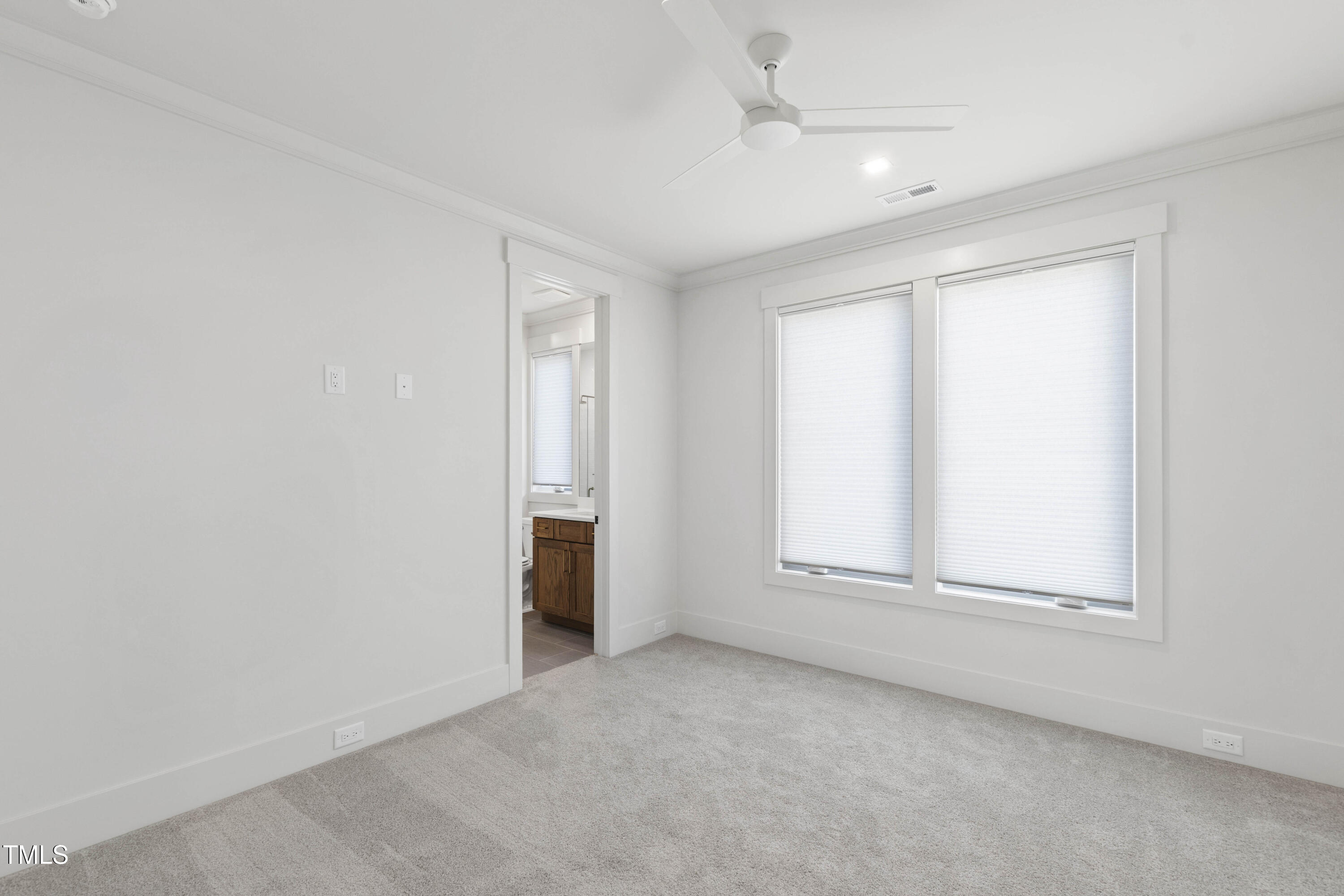 202 Georgetown Road Raleigh, NC 27608 - Photo 50 of 64 an empty room with a empty space and windows