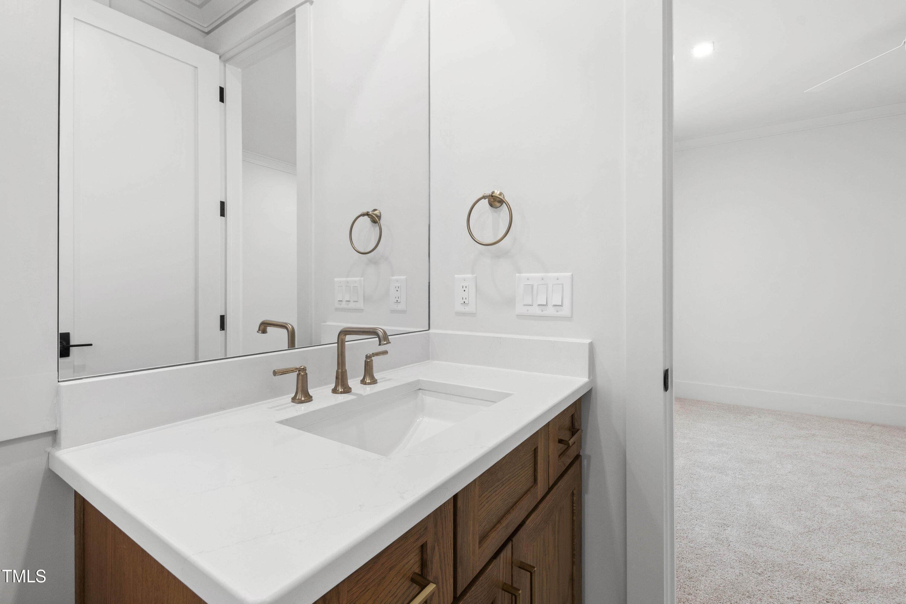 202 Georgetown Road Raleigh, NC 27608 - Photo 51 of 64 a bathroom with a sink vanity and a mirror