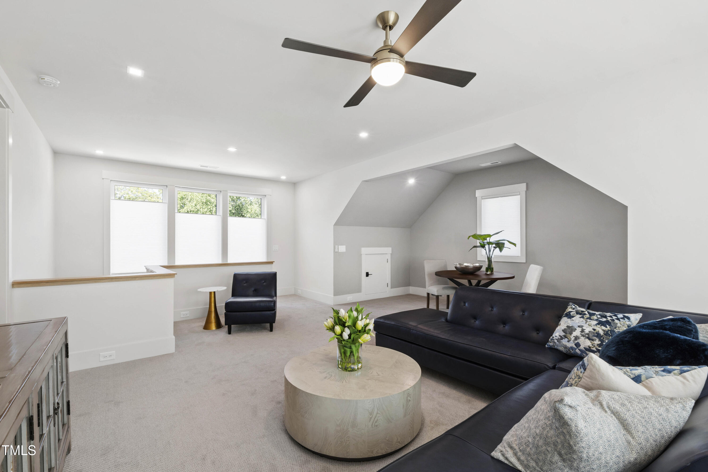 202 Georgetown Road Raleigh, NC 27608 - Photo 57 of 64 a living room with furniture and a wooden floor