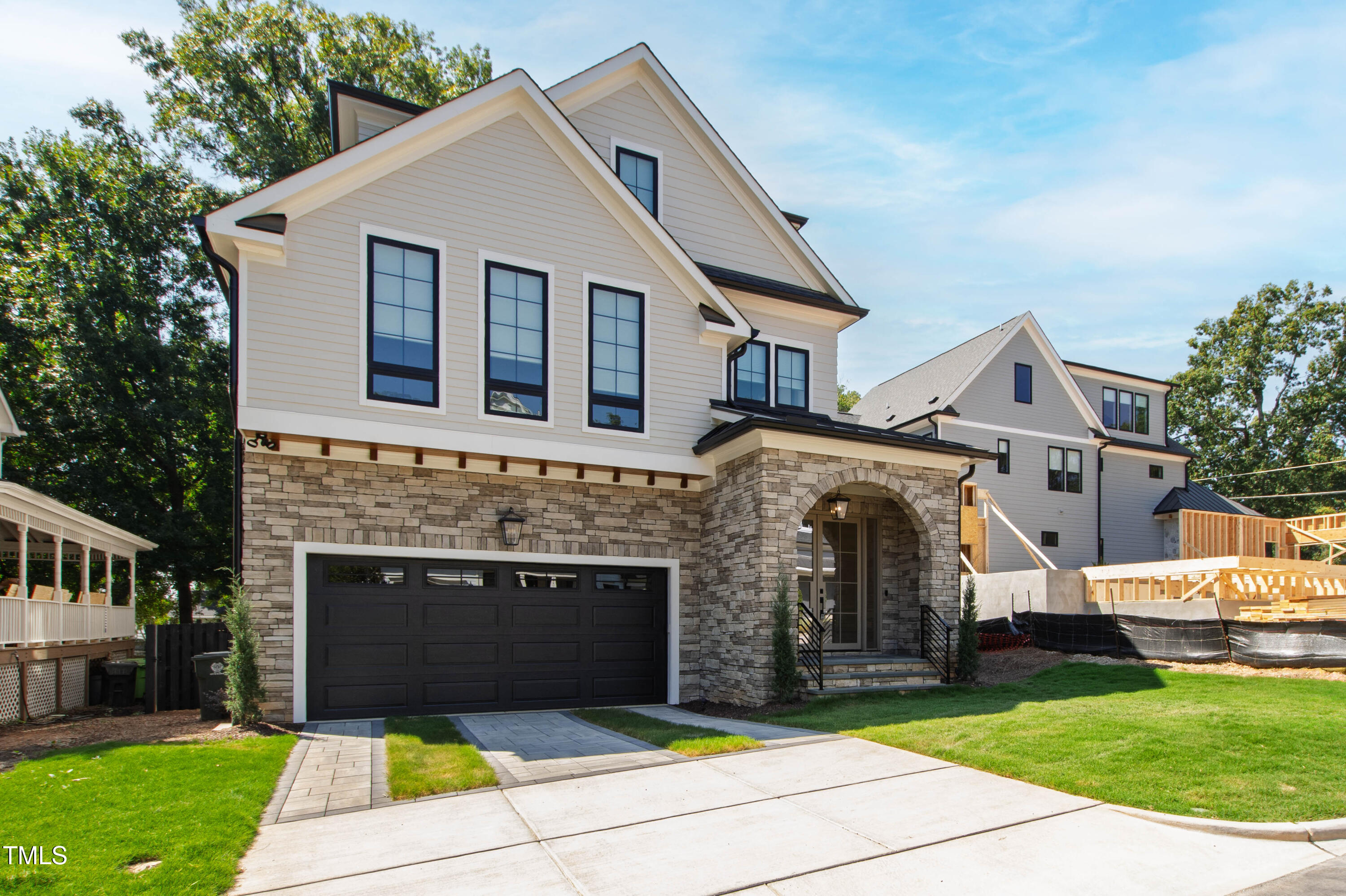 202 Georgetown Road Raleigh, NC 27608 - Photo 64 of 64 a front view of house with yard and garage