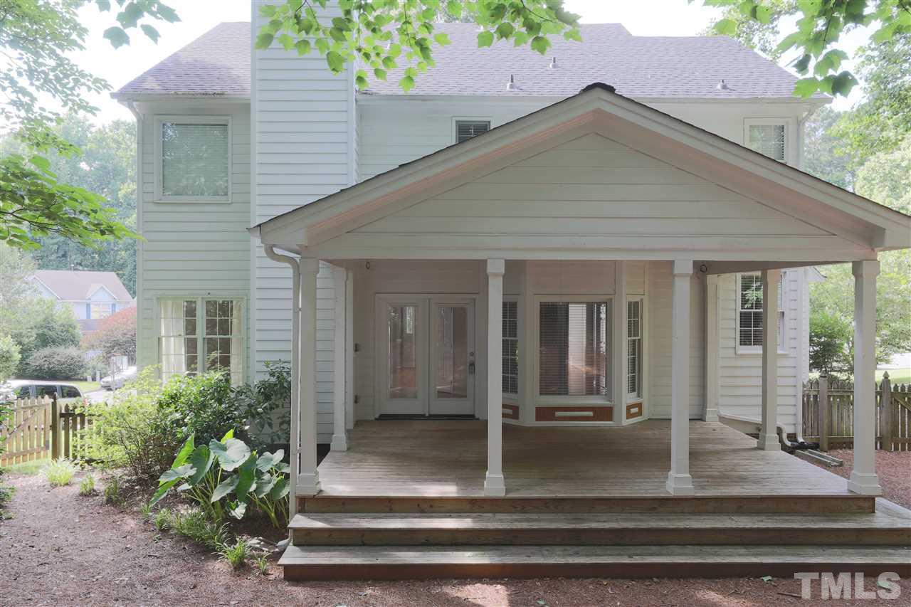 5625 Barham Court Raleigh, NC 27613 - Photo 22 of 23 a front view of a house with porch