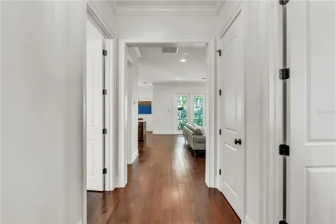 a view of entryway with livingroom and wooden floor