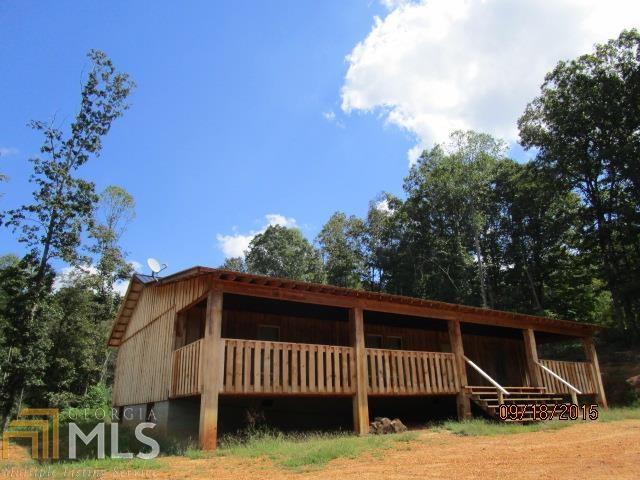 2346 Athens Road Royston, GA 30662 - Photo 1 of 1 a view of backyard with deck and outdoor seating