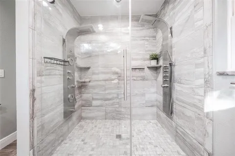 a kitchen view of a stove and a refrigerator