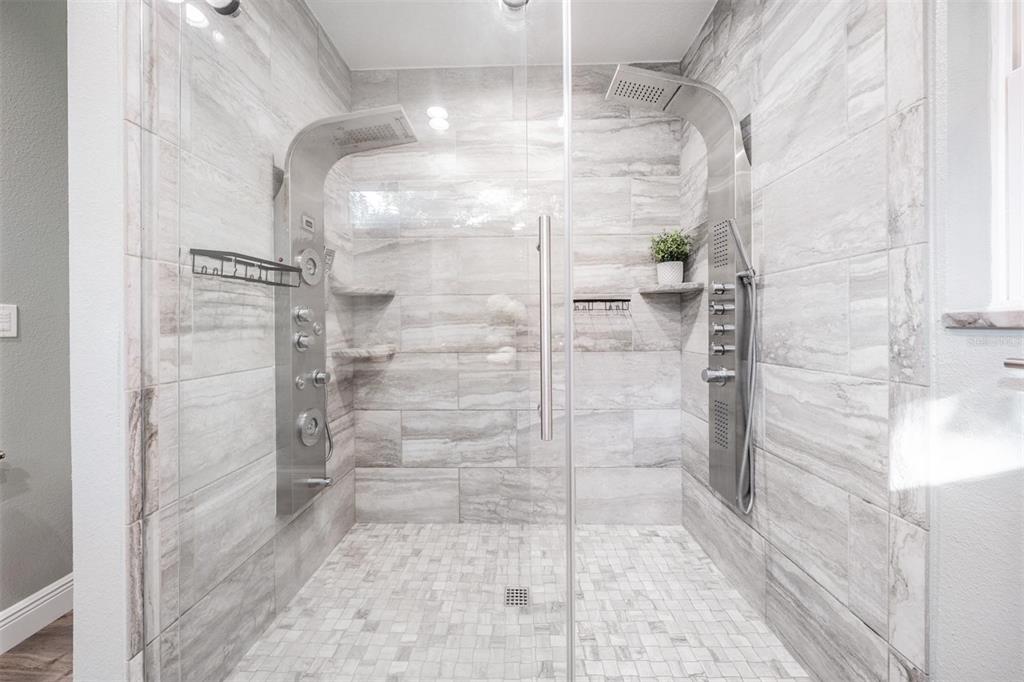 3216 West Fielder Street Tampa, FL 33611 - Photo 16 of 34 a bathroom with a shower