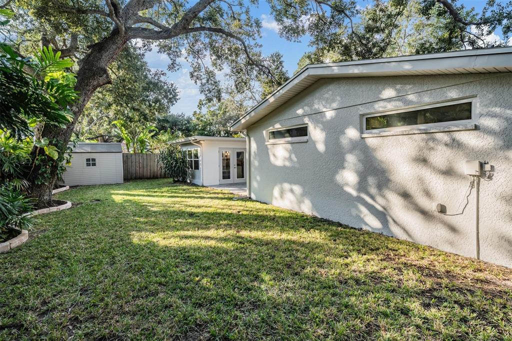 3216 West Fielder Street Tampa, FL 33611 - Photo 28 of 34 a view of a house with a yard