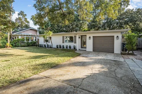 a view of a house with swimming pool