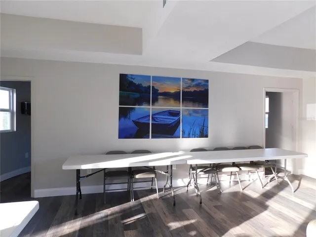 a living room with a couch and a window