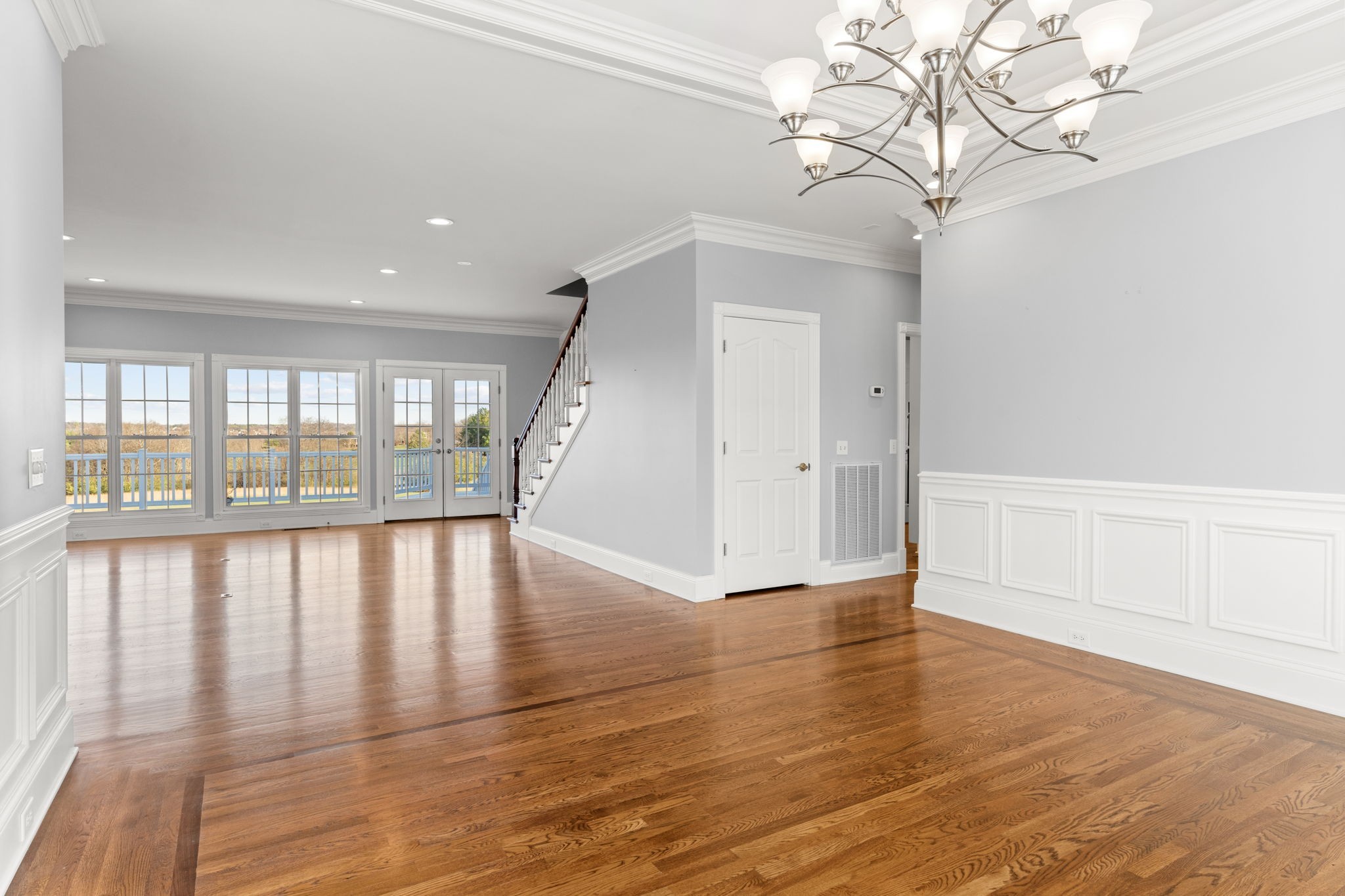 1729 Hudson Road Madison, TN 37115 - Photo 11 of 69 a view of an empty room with wooden floor and a window