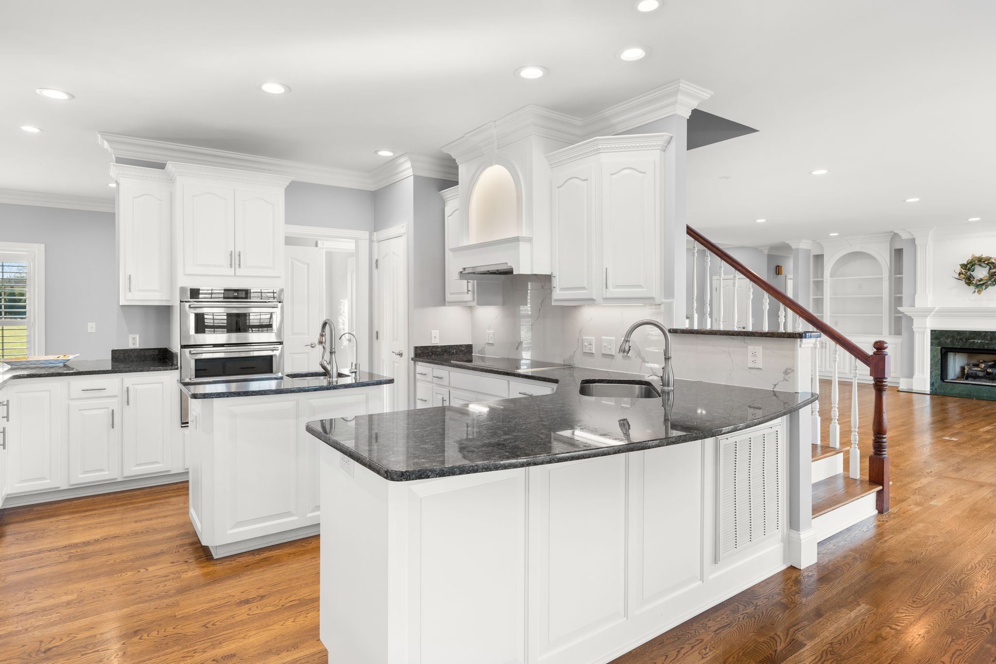 1729 Hudson Road Madison, TN 37115 - Photo 16 of 69 a kitchen with stainless steel appliances granite countertop a sink a stove and a wooden floors