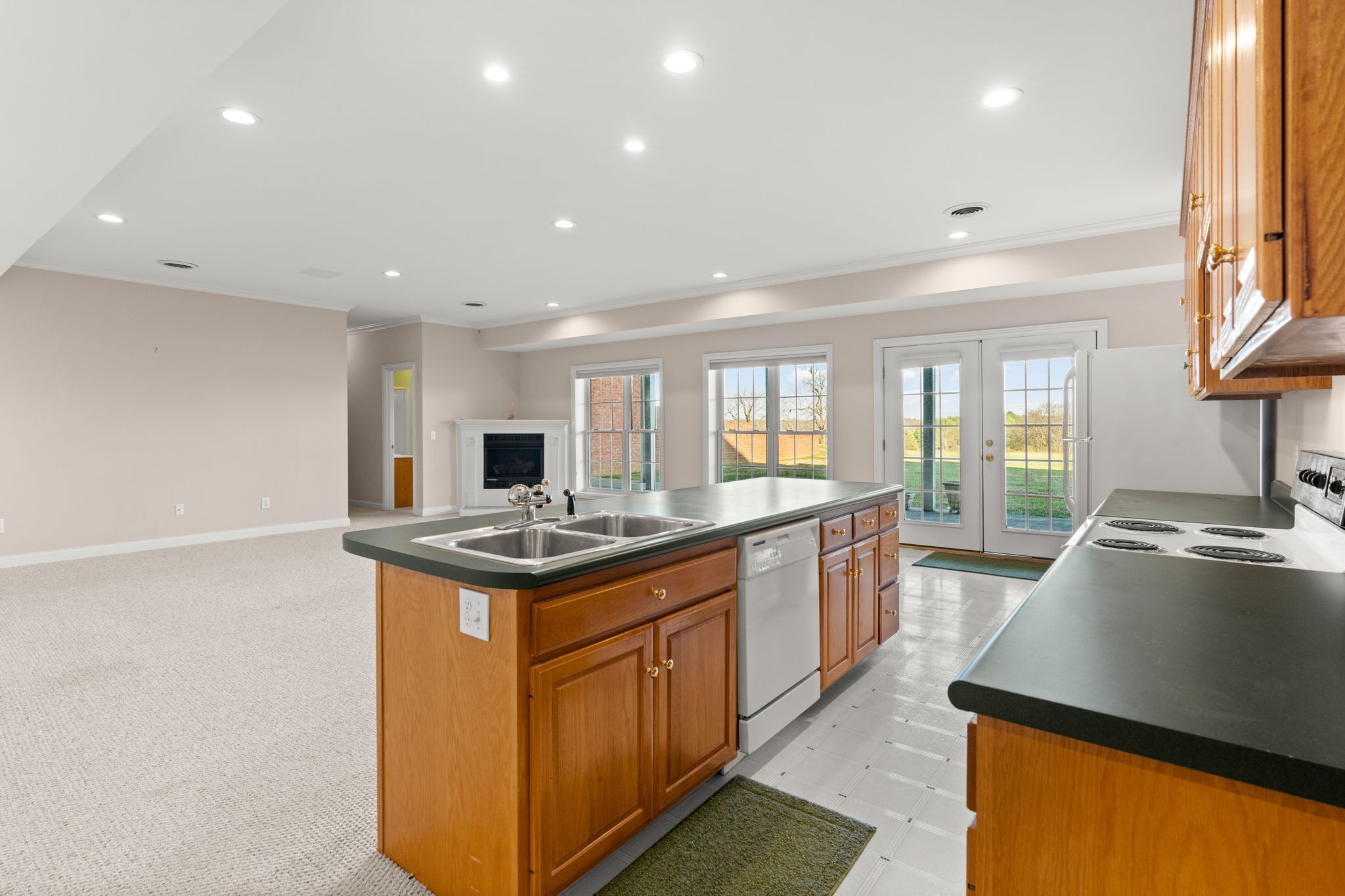 1729 Hudson Road Madison, TN 37115 - Photo 36 of 69 a kitchen with stainless steel appliances granite countertop a stove and a sink