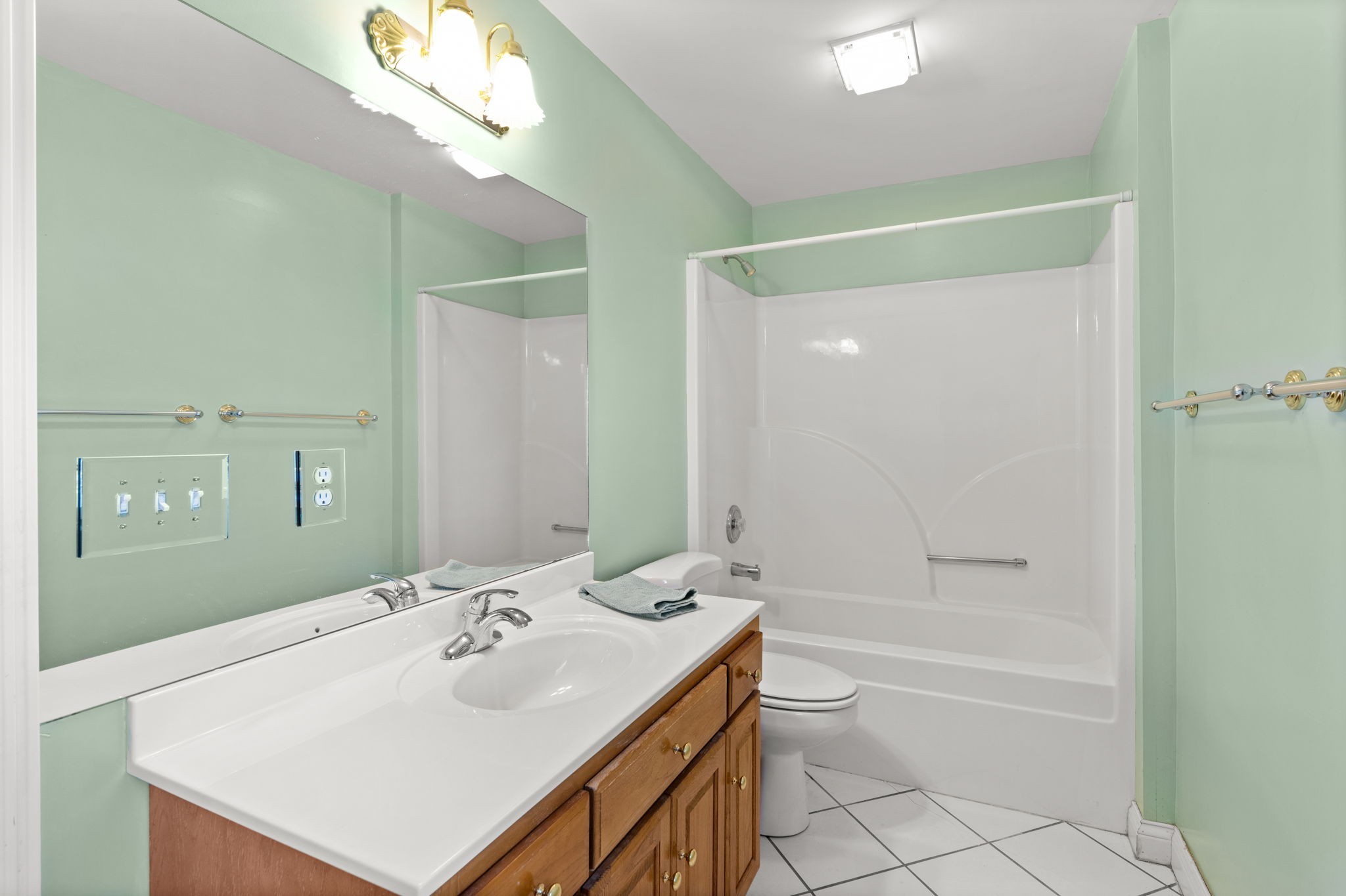 1729 Hudson Road Madison, TN 37115 - Photo 42 of 69 a bathroom with a sink vanity tub and a mirror