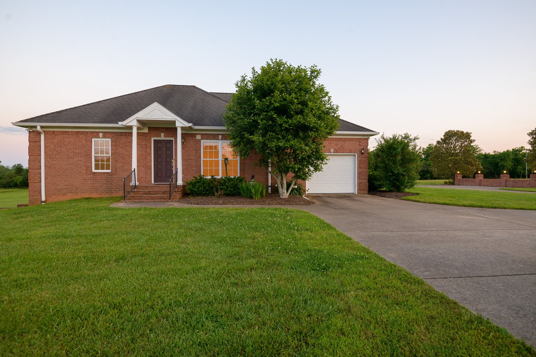 1729 Hudson Road Madison, TN 37115 - Photo 52 of 69 a front view of a house with a yard and garage