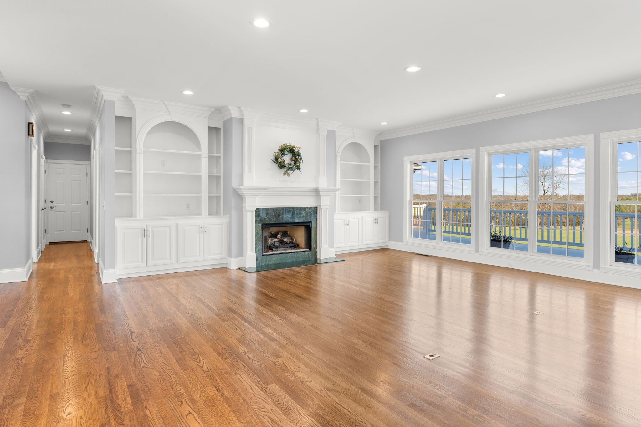 1729 Hudson Road Madison, TN 37115 - Photo 7 of 69 a view of empty room with wooden floor and fireplace