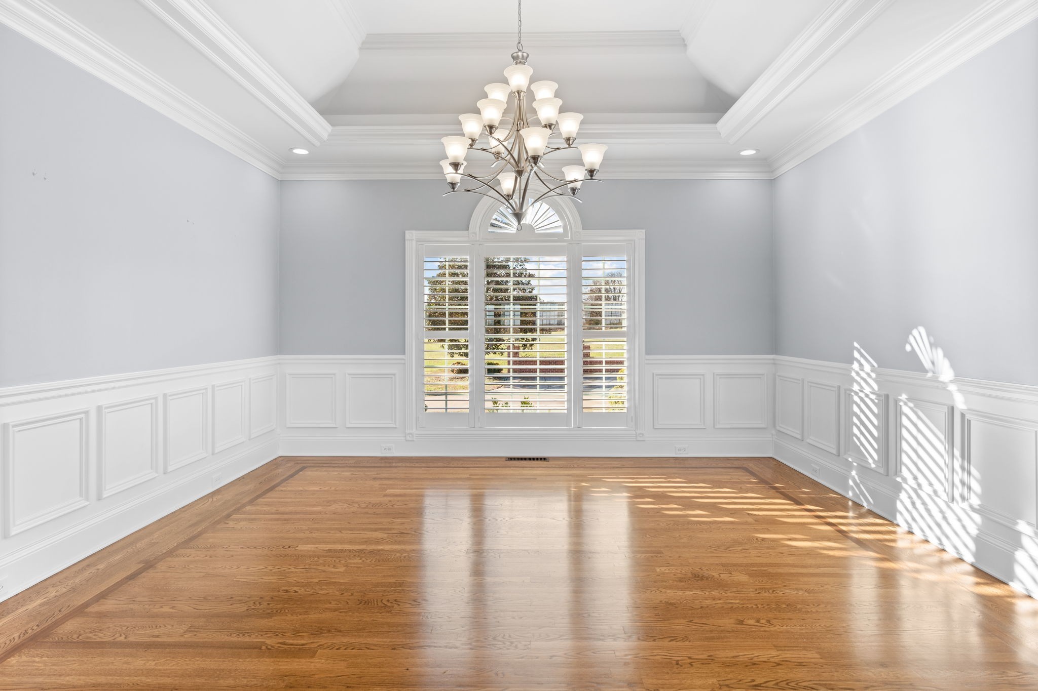 1729 Hudson Road Madison, TN 37115 - Photo 10 of 69 a view of an empty room with wooden floor and a window