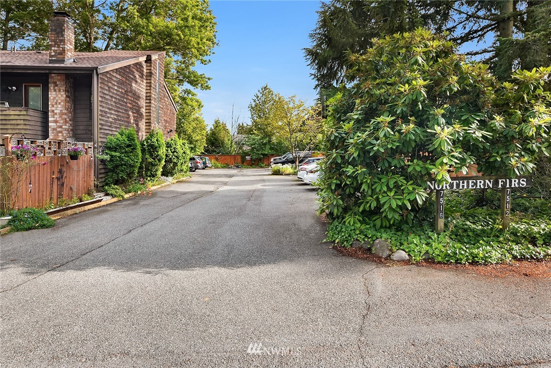 7512 218th Street Southwest, Unit 5 Edmonds, WA 98026 - Photo 2 of 25 a view of a back yard of the house