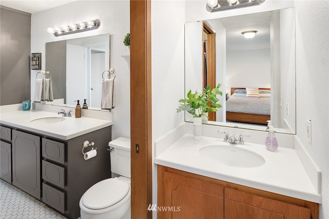 7512 218th Street Southwest, Unit 5 Edmonds, WA 98026 - Photo 18 of 25 a bathroom with a sink and a mirror
