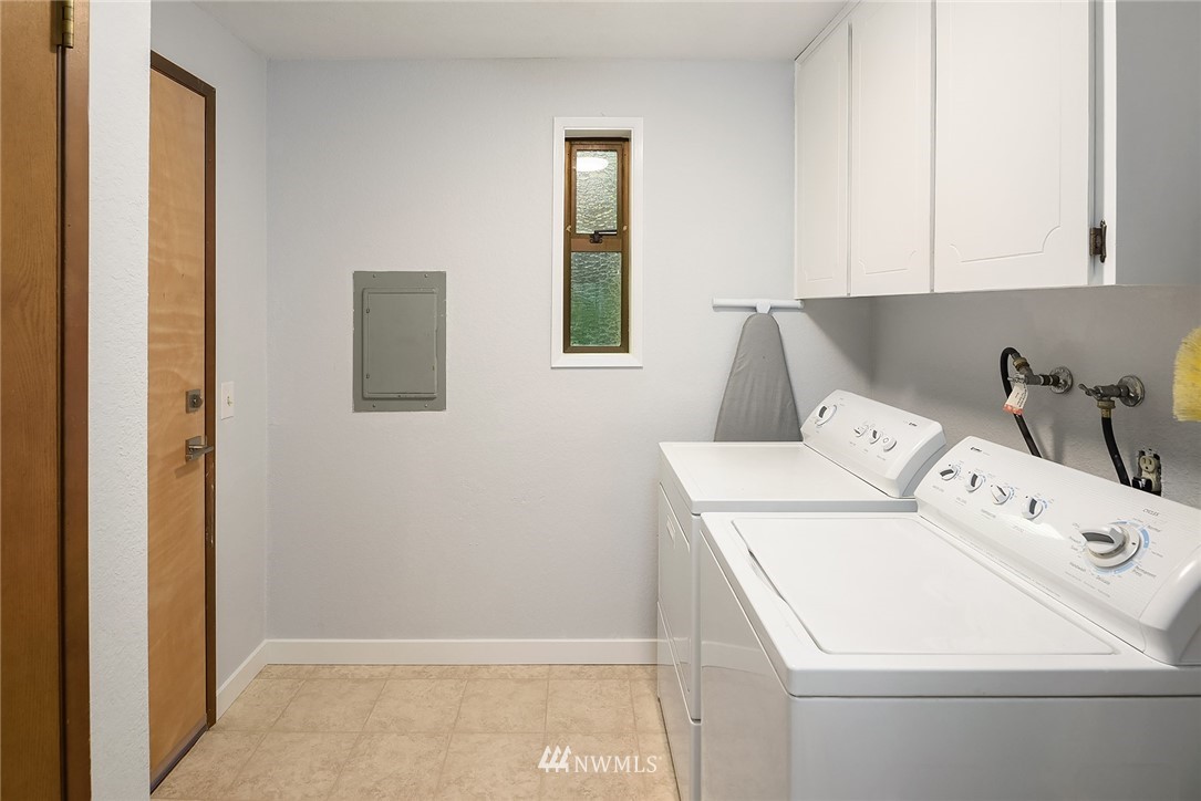 7512 218th Street Southwest, Unit 5 Edmonds, WA 98026 - Photo 6 of 25 a utility room with dryer and washer
