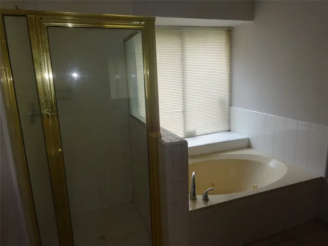 a bathroom with a bathtub