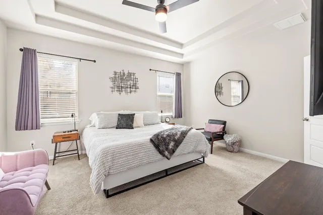 a bedroom with a bed furniture and a window