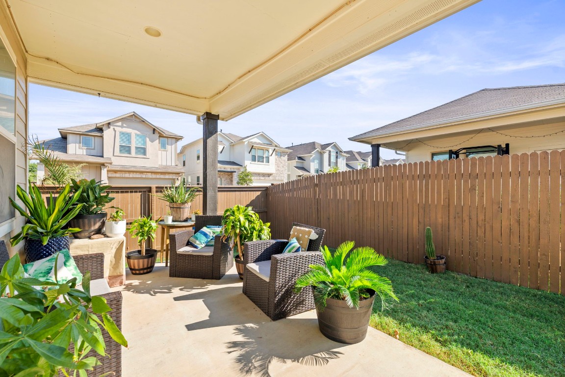 11901 Dispatch Way Austin, TX 78748 - Photo 16 of 18 a view of a chairs and table in a backyard