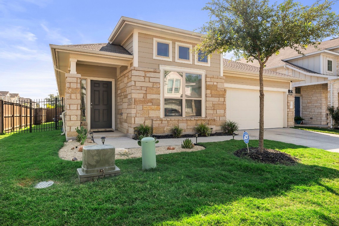 11901 Dispatch Way Austin, TX 78748 - Photo 18 of 18 a front view of a house with garden