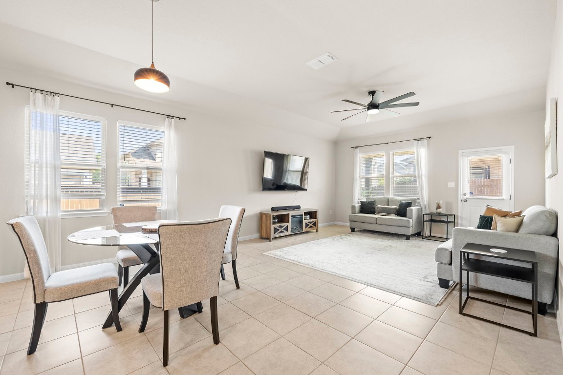 11901 Dispatch Way Austin, TX 78748 - Photo 2 of 18 a living room with furniture and a large window