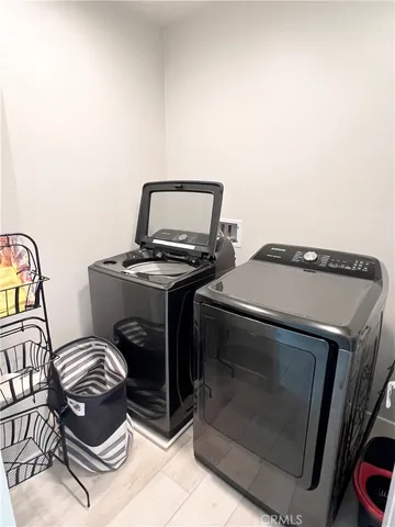 a stove top oven sitting inside of a kitchen