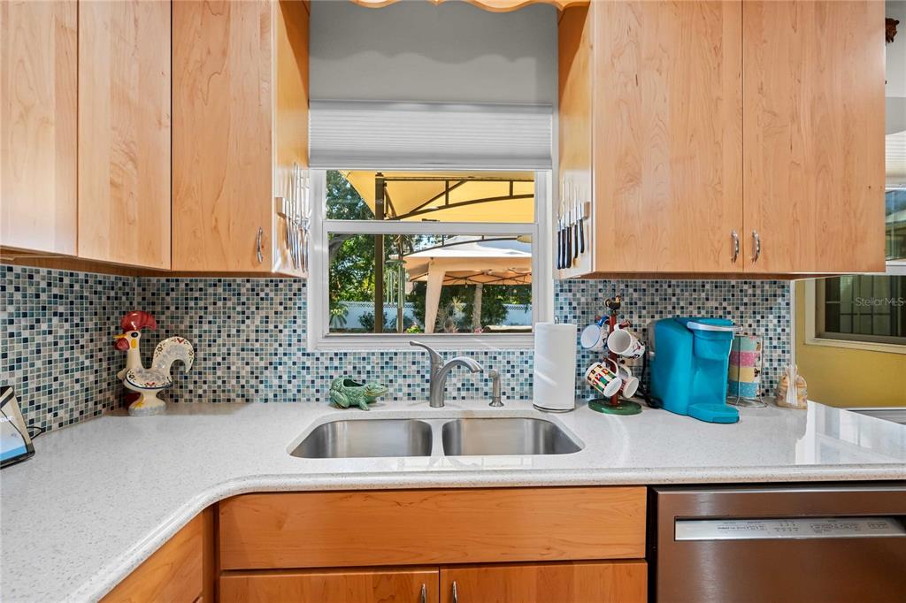 1109 Commodore Street Clearwater, FL 33755 - Photo 11 of 42 a kitchen with a sink and a window