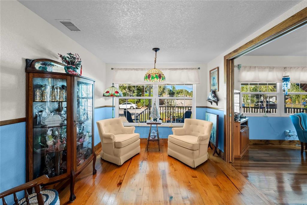 1109 Commodore Street Clearwater, FL 33755 - Photo 14 of 42 a living room with furniture and a window